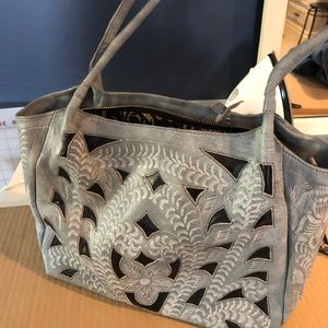 Leaders in Leather cutout tote
